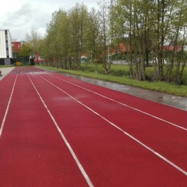 Onderhoud atletiekpiste van Basic Fit in Hasselt - afbeelding