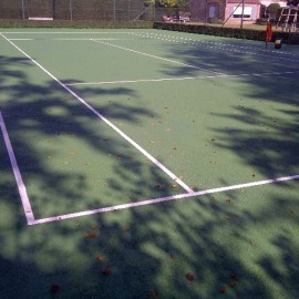 Aanleg van rubberen TechTenn tennisterreinen in Brugge - afbeelding