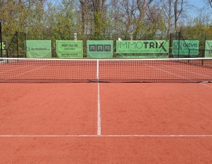 Aanleg allweather kunstgras tennisterrein bij TC Brabo in Schilde